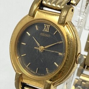 Vintage Seiko Watch Women 24mm Gold Tone Black Dial V701-1781 New Battery 6.25"